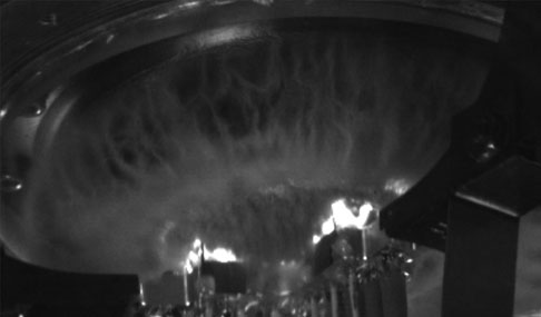 A black and white image showing the impact of an explosion on a diagnostic probe. 