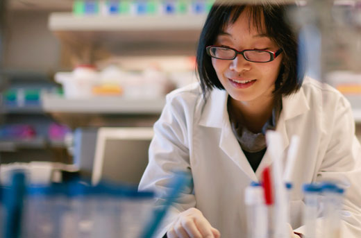 Bioengineer in white lab coat.